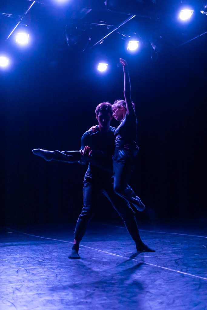 dancer with arms raised